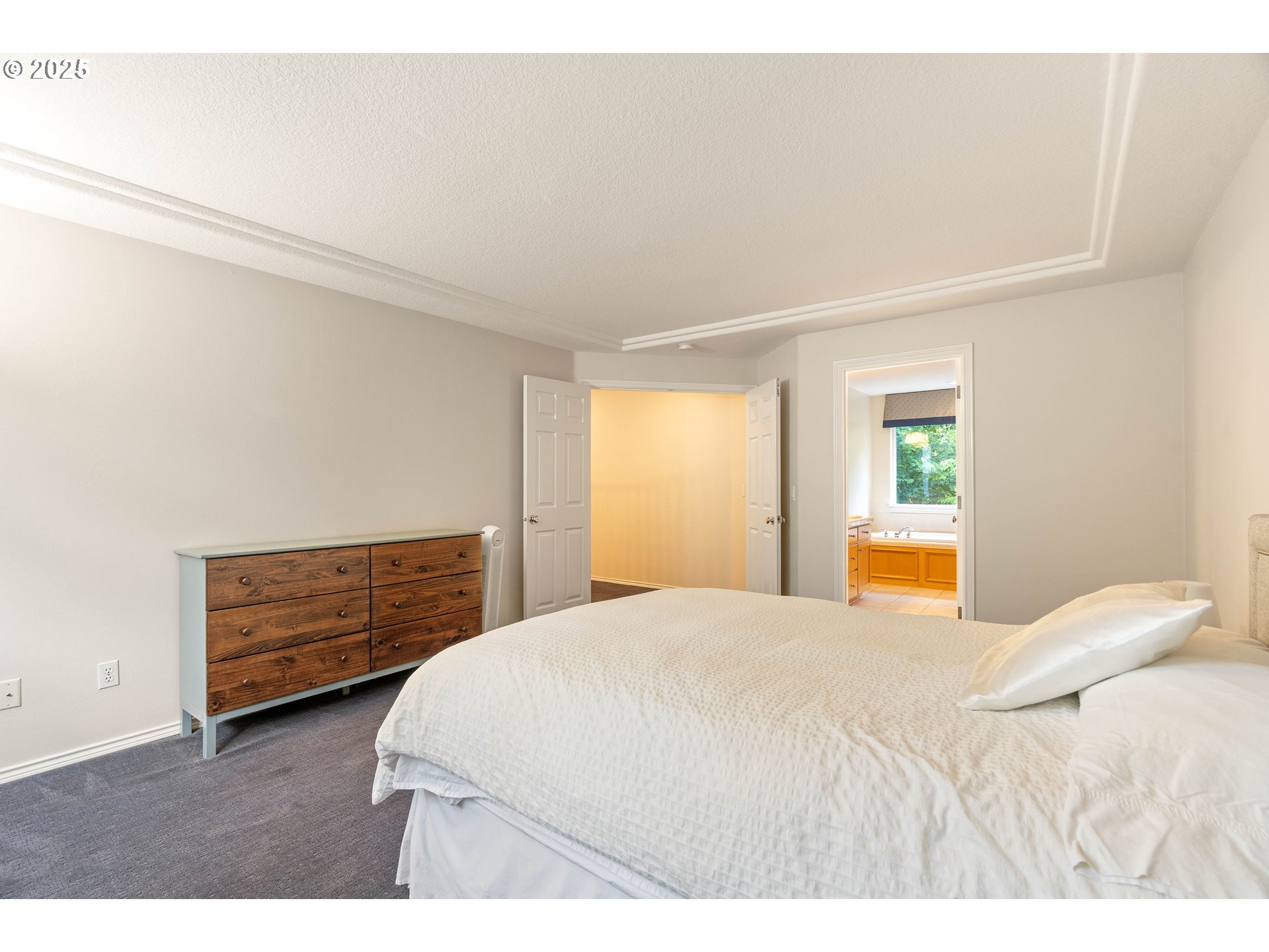 4014 Southwest 96th Avenue Portland, OR 97225 - Photo 31 of 48 a bedroom with a bed and window