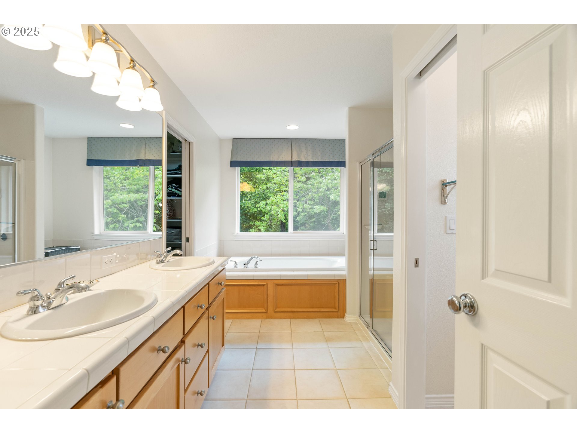 4014 Southwest 96th Avenue Portland, OR 97225 - Photo 32 of 48 a bathroom with a sink and a bathtub