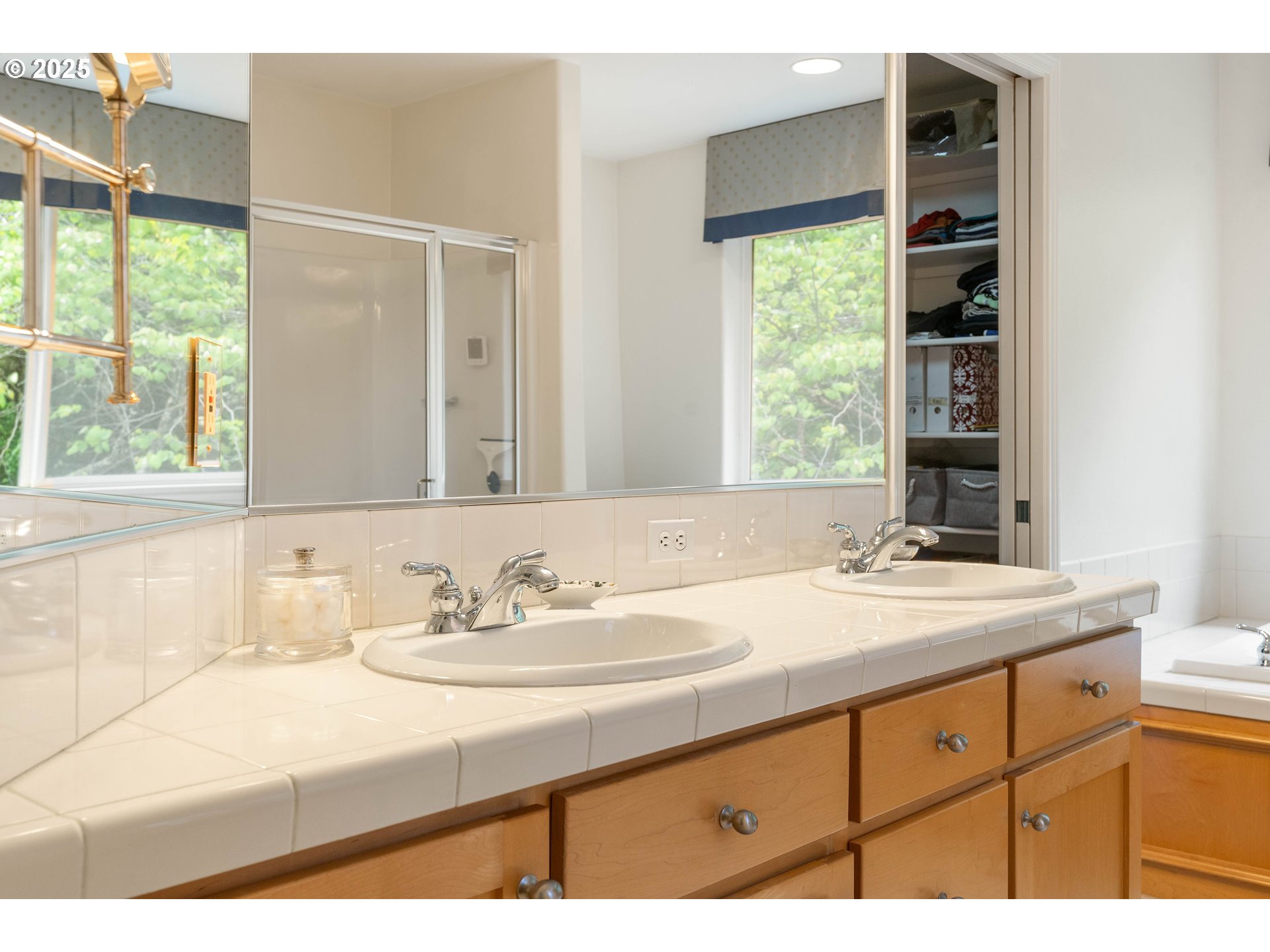 4014 Southwest 96th Avenue Portland, OR 97225 - Photo 33 of 48 a bathroom with a sink and a mirror