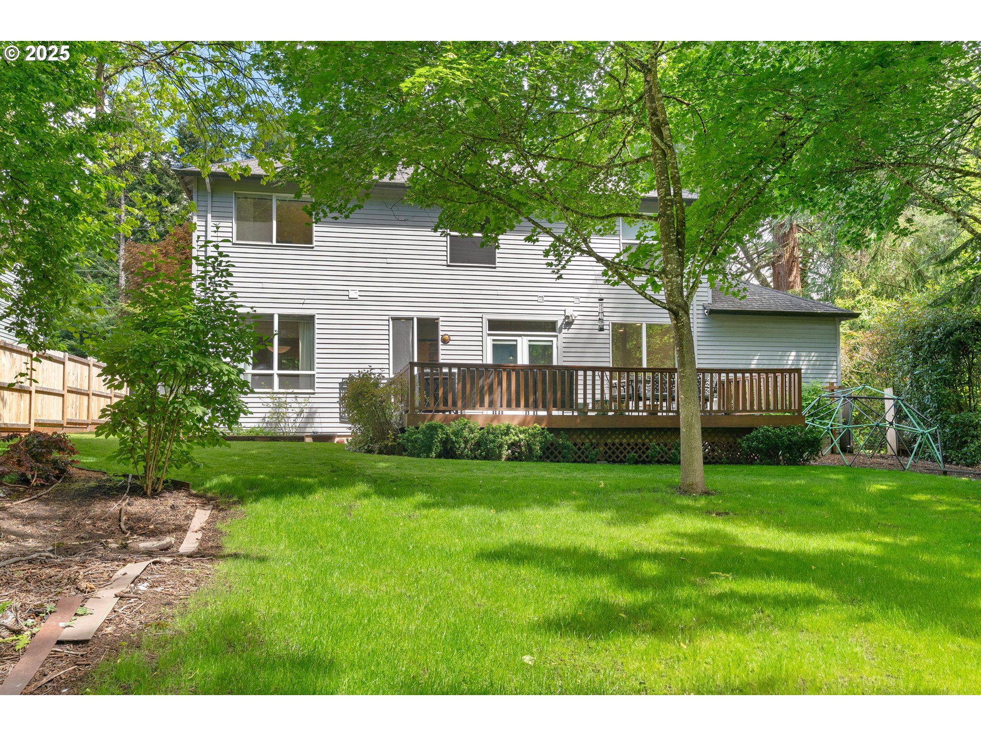 4014 Southwest 96th Avenue Portland, OR 97225 - Photo 44 of 48 a view of a house with a backyard
