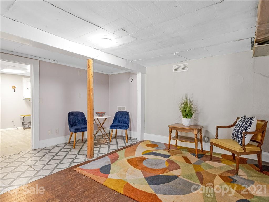 604 Fairview Road Asheville, NC 28803 - Photo 11 of 18 a view of a livingroom and dining room