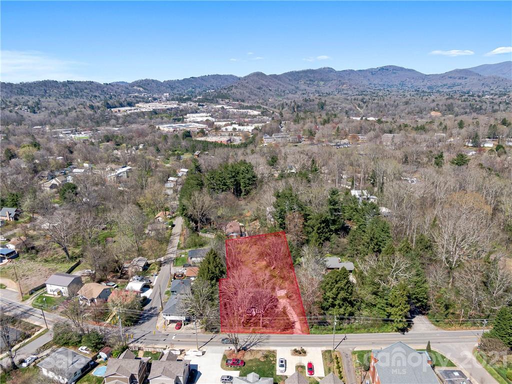 604 Fairview Road Asheville, NC 28803 - Photo 17 of 18 an aerial view of residential house and sandy dunes
