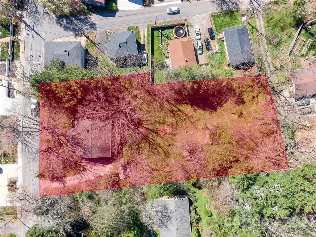 604 Fairview Road Asheville, NC 28803 - Photo 18 of 18 an aerial view of a house with a yard and garden