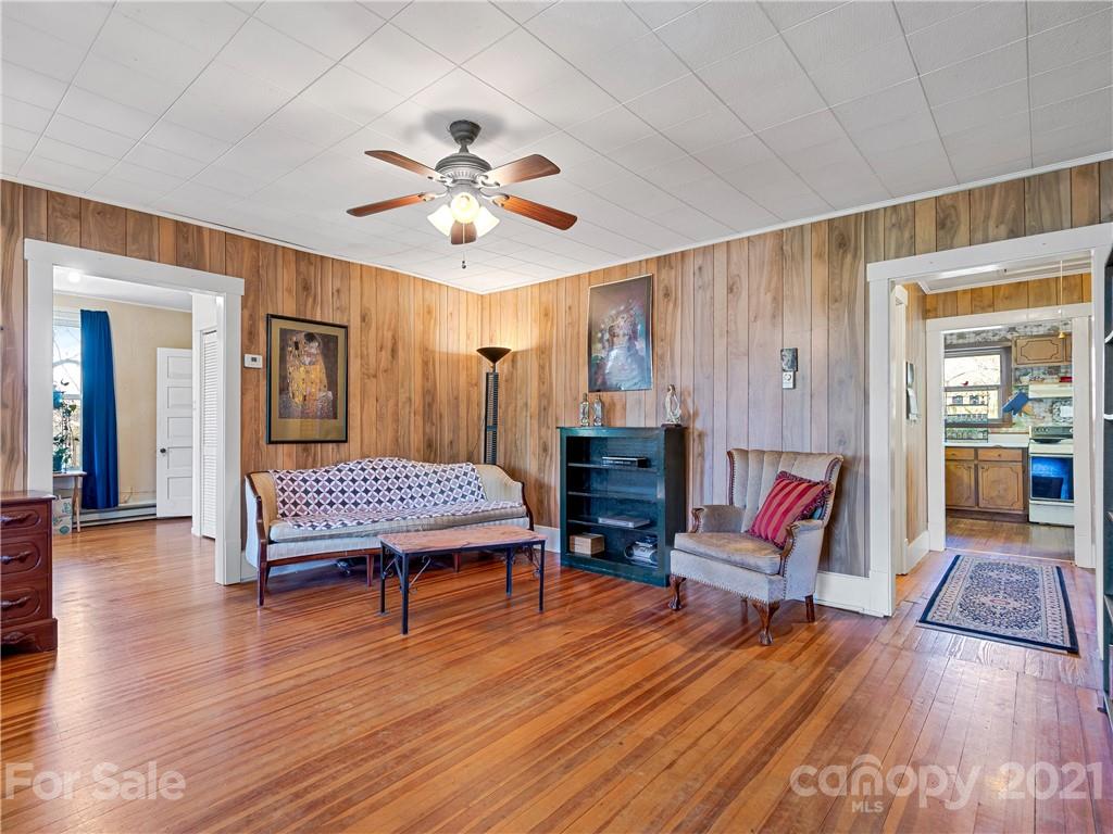 604 Fairview Road Asheville, NC 28803 - Photo 3 of 18 an aerial view of a house with a yard and garden