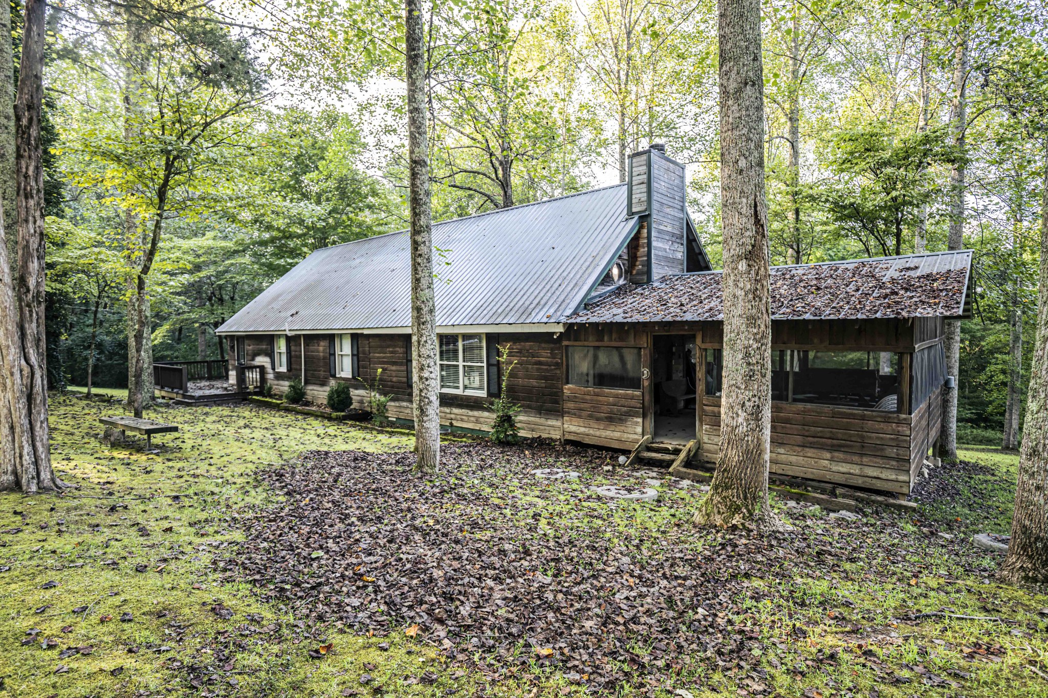8781 Richards Road Lyles, TN 37098 - Photo 11 of 50 a front view of a house with garden