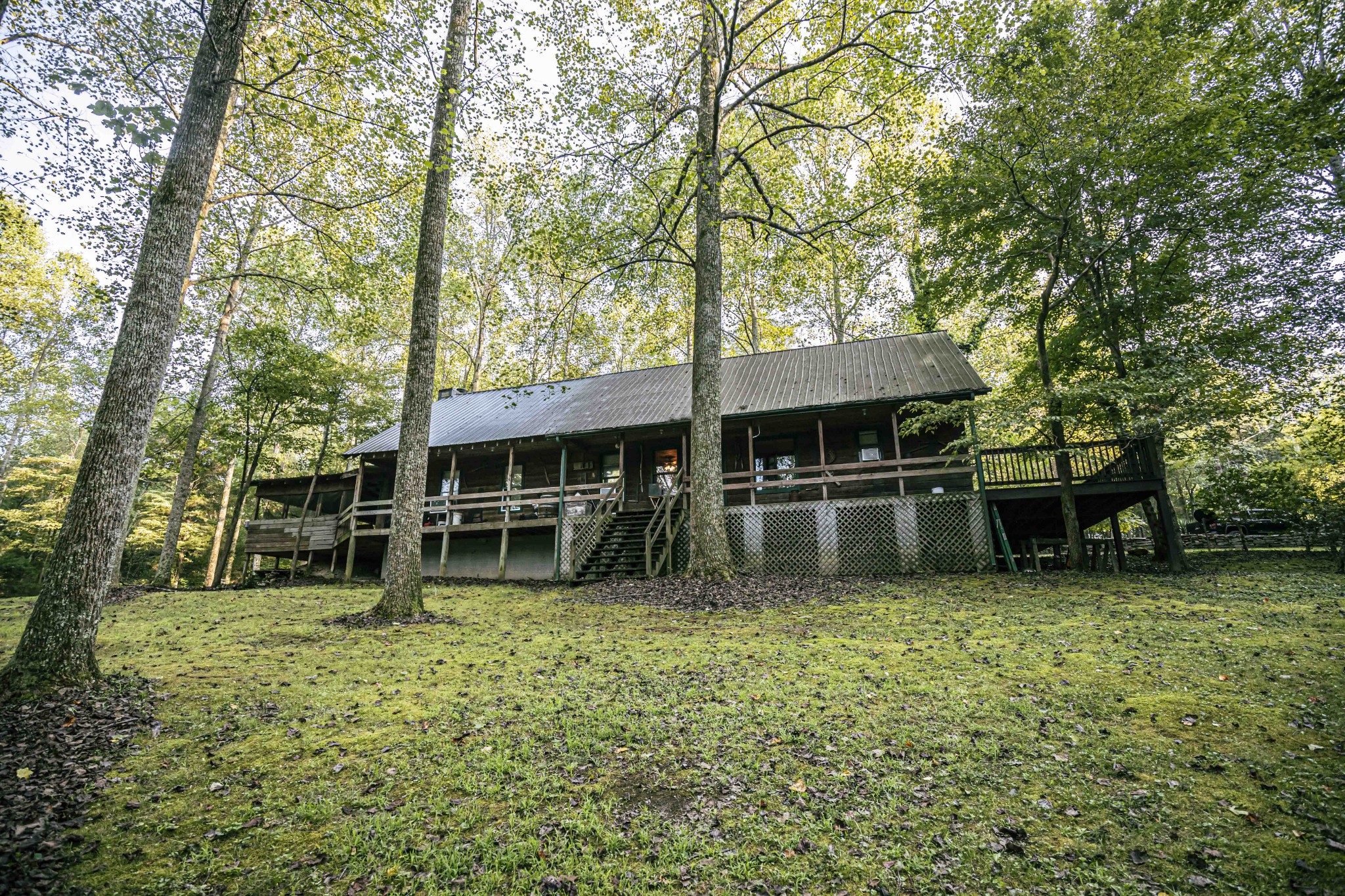 8781 Richards Road Lyles, TN 37098 - Photo 14 of 50 a view of a house with a backyard