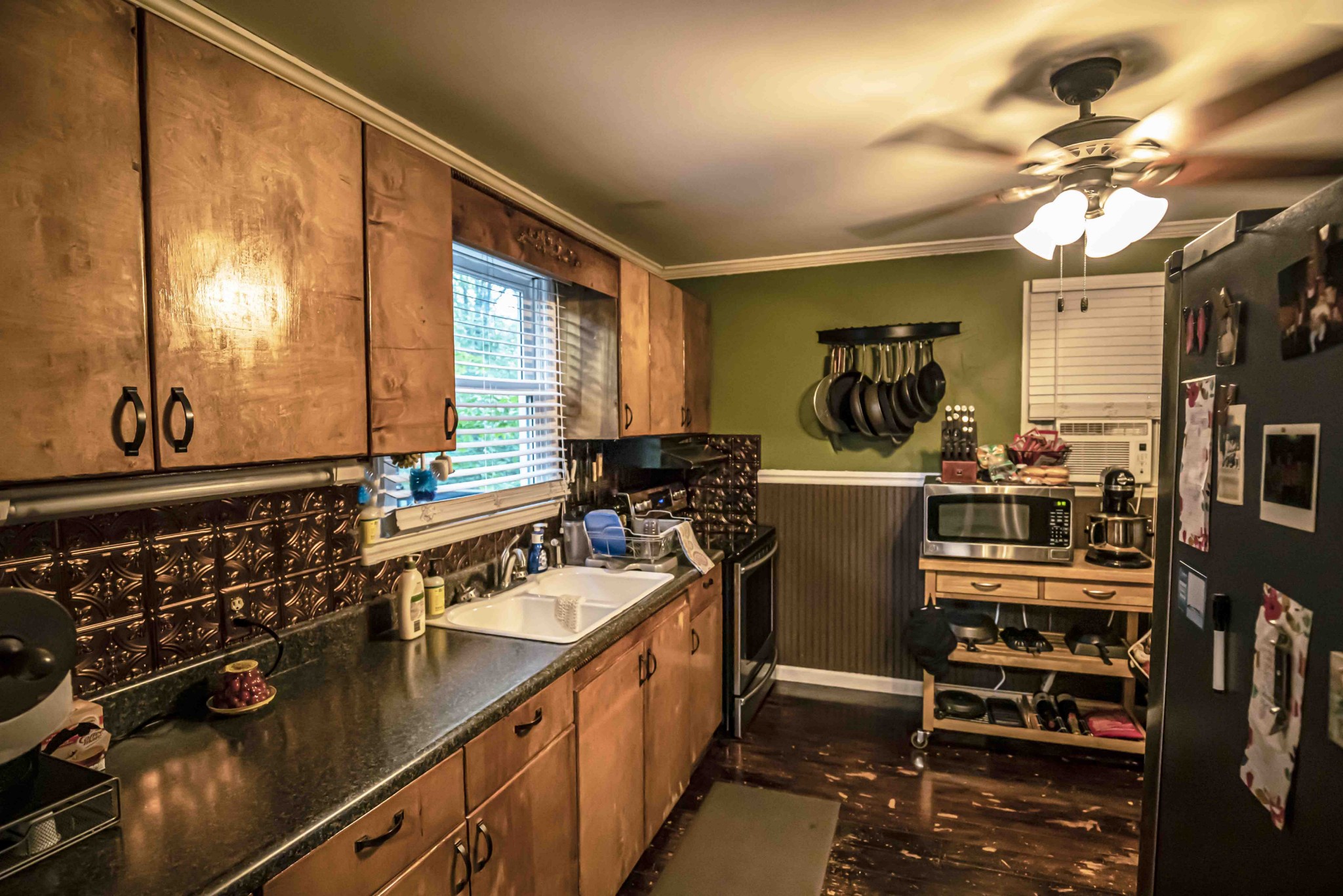 8781 Richards Road Lyles, TN 37098 - Photo 22 of 50 a kitchen with a sink appliances and cabinets