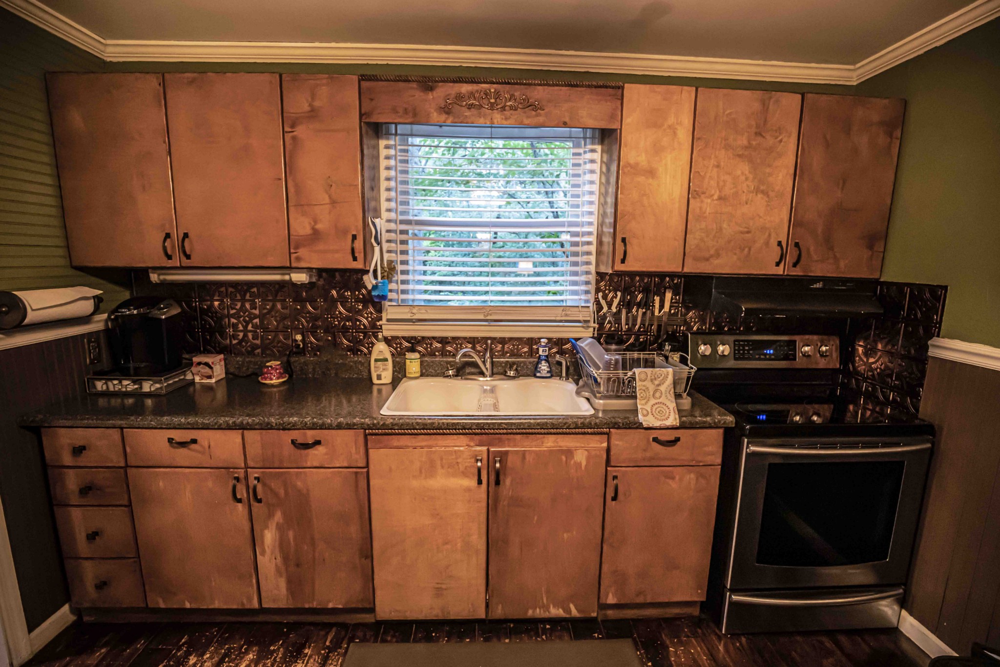 8781 Richards Road Lyles, TN 37098 - Photo 23 of 50 a kitchen with a stove and a microwave