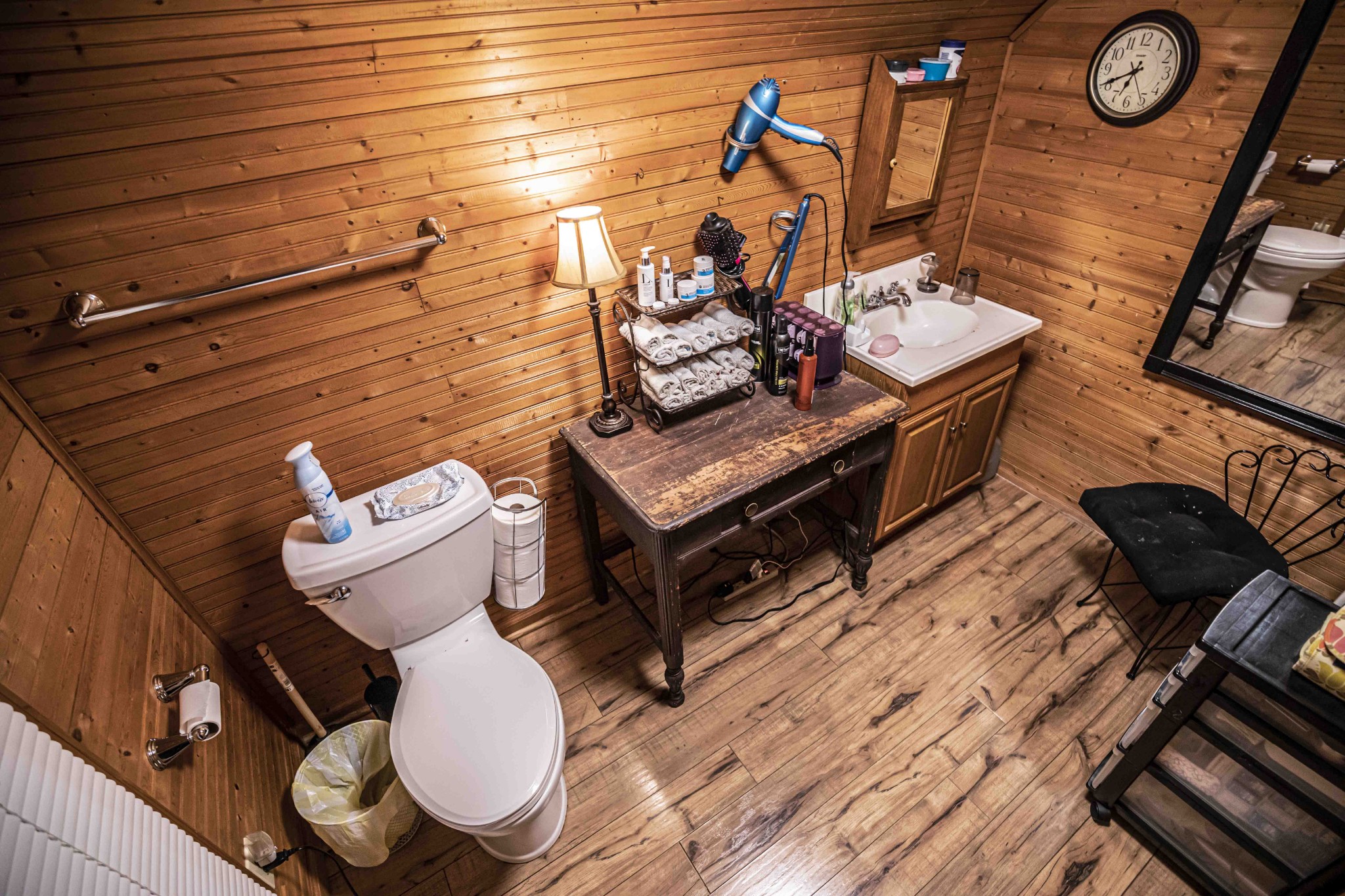 8781 Richards Road Lyles, TN 37098 - Photo 38 of 50 a bathroom with a toilet and a mirror