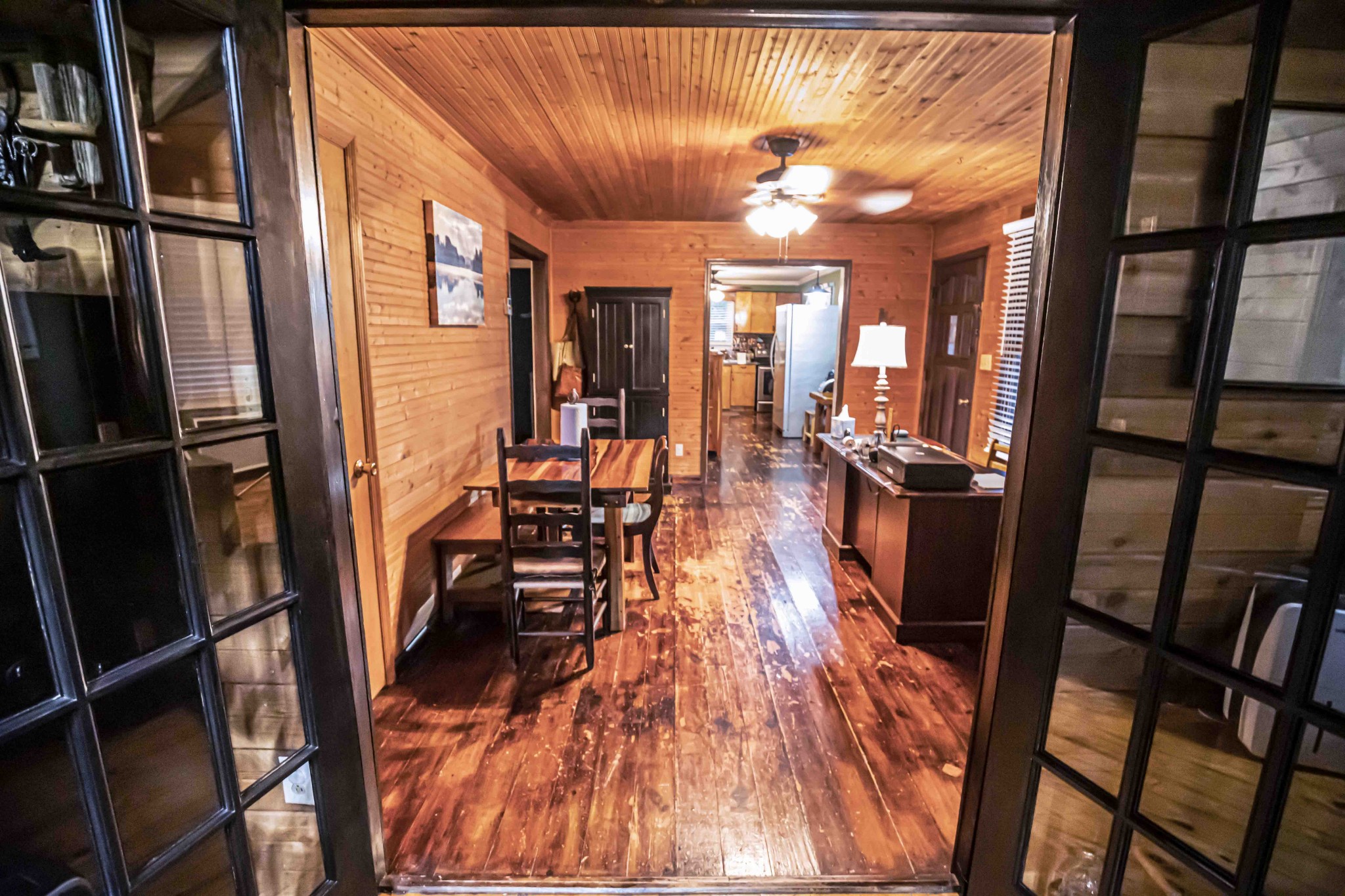8781 Richards Road Lyles, TN 37098 - Photo 47 of 50 a view of a dining room with furniture window and wooden floor