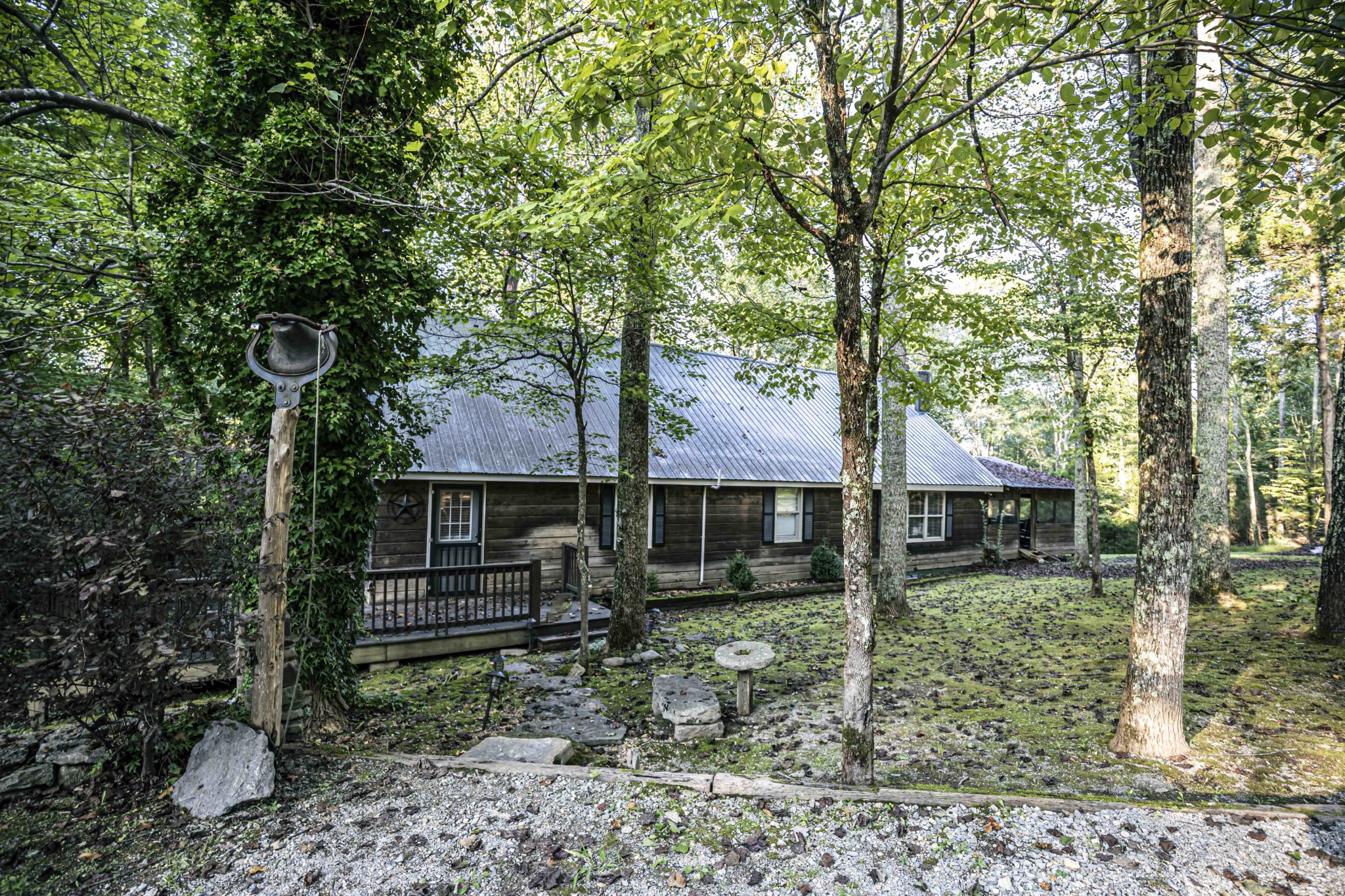 8781 Richards Road Lyles, TN 37098 - Photo 9 of 50 a front view of a house with garden