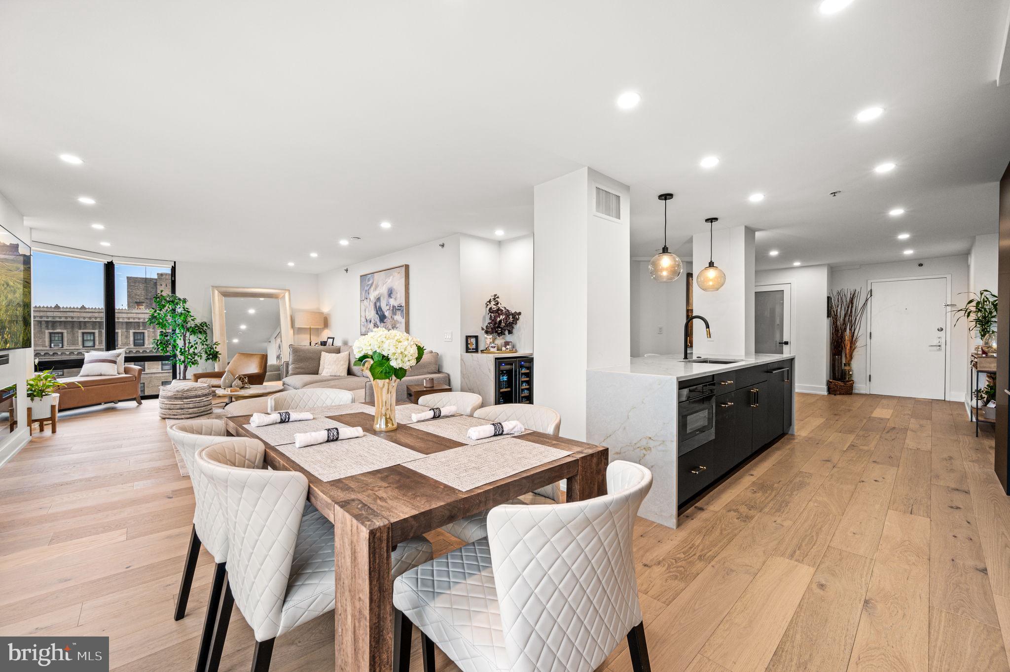 2020 Walnut Street, Unit 19LM Philadelphia, PA 19103 - Photo 2 of 60 a large kitchen with a table and chairs