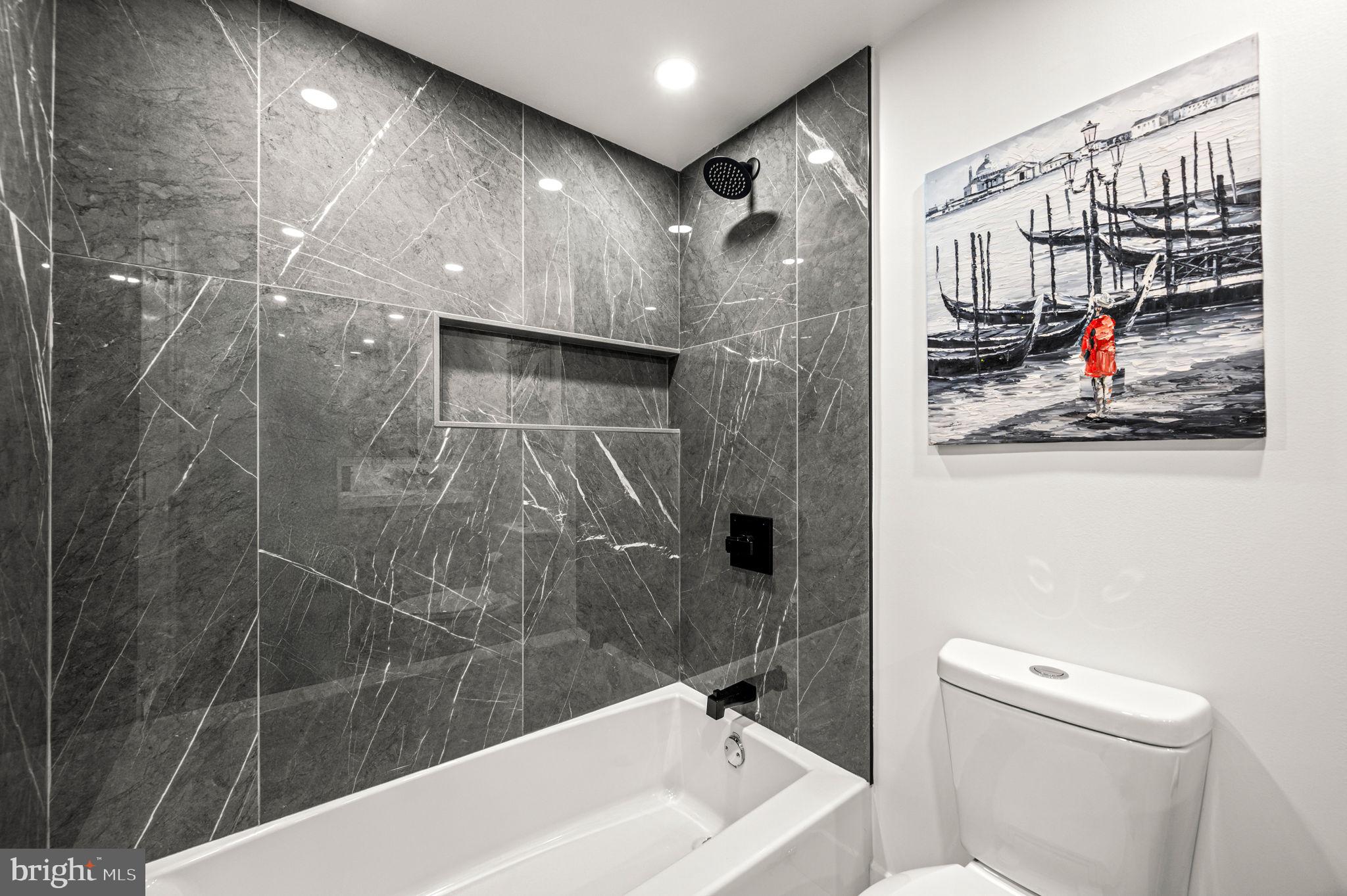 2020 Walnut Street, Unit 19LM Philadelphia, PA 19103 - Photo 30 of 60 a bathroom with a shower and a toilet