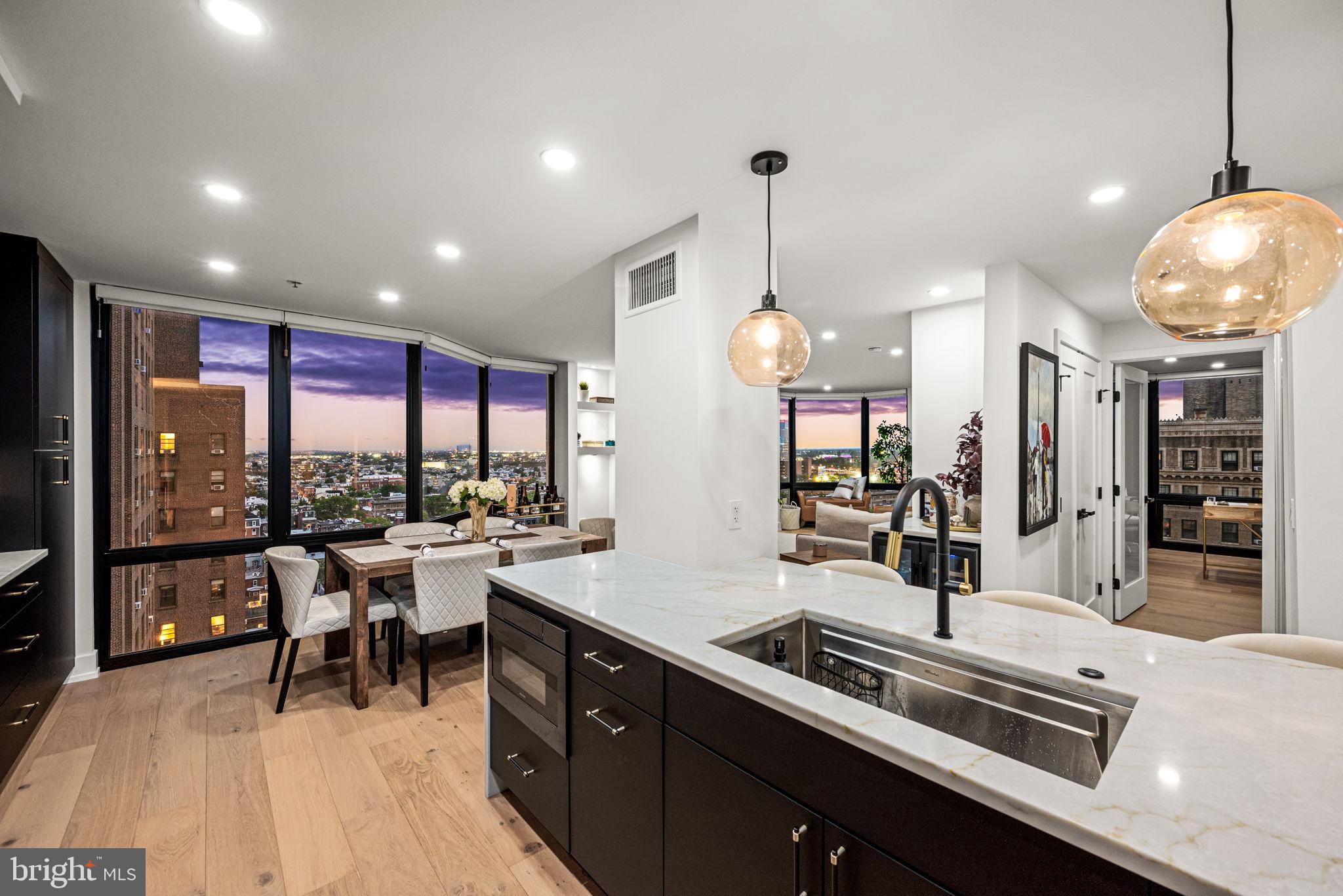 2020 Walnut Street, Unit 19LM Philadelphia, PA 19103 - Photo 6 of 60 a kitchen with a sink appliances and cabinets