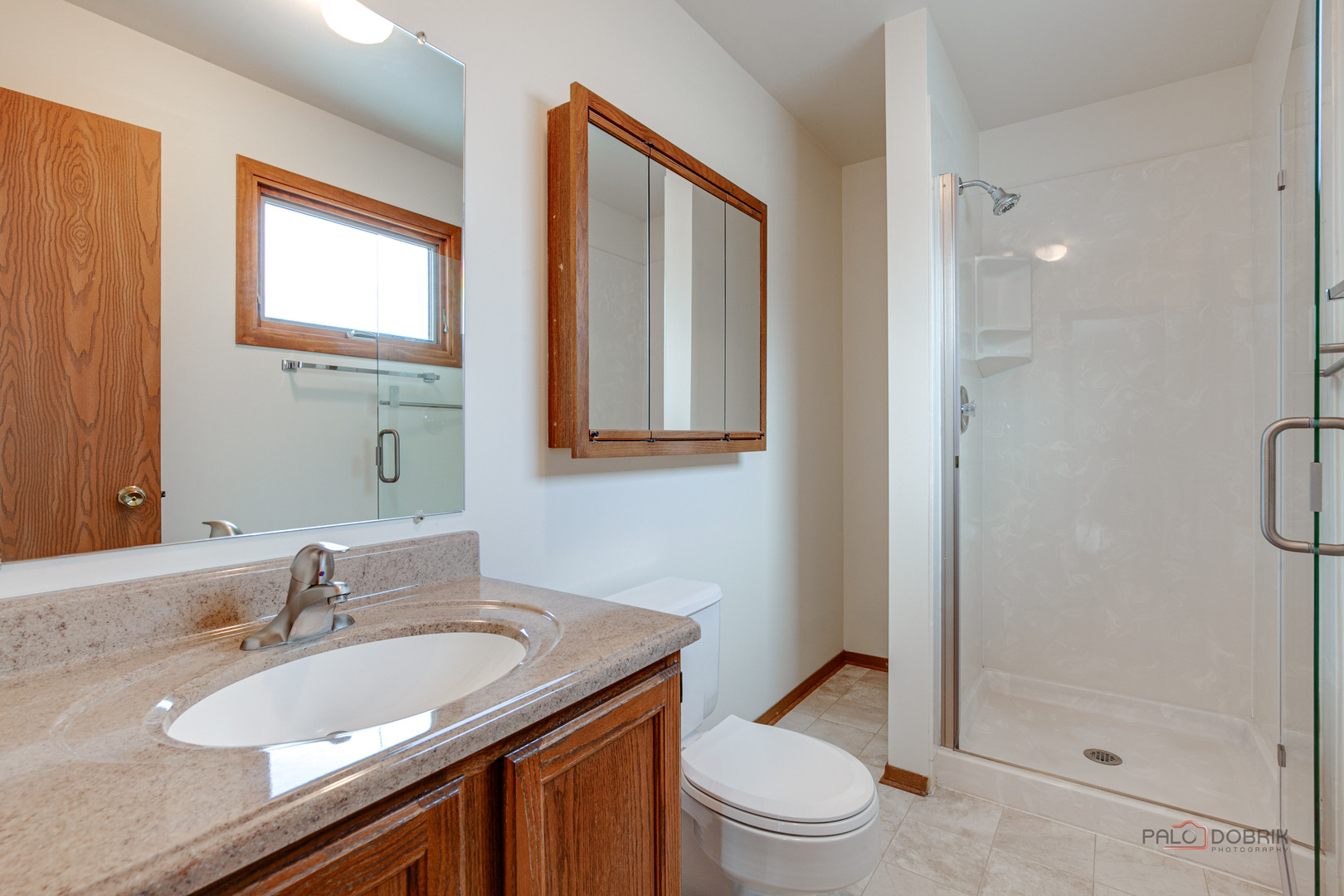 4481 Country Trail Gurnee, IL 60031 - Photo 24 of 42 a bathroom with a granite countertop sink toilet and shower