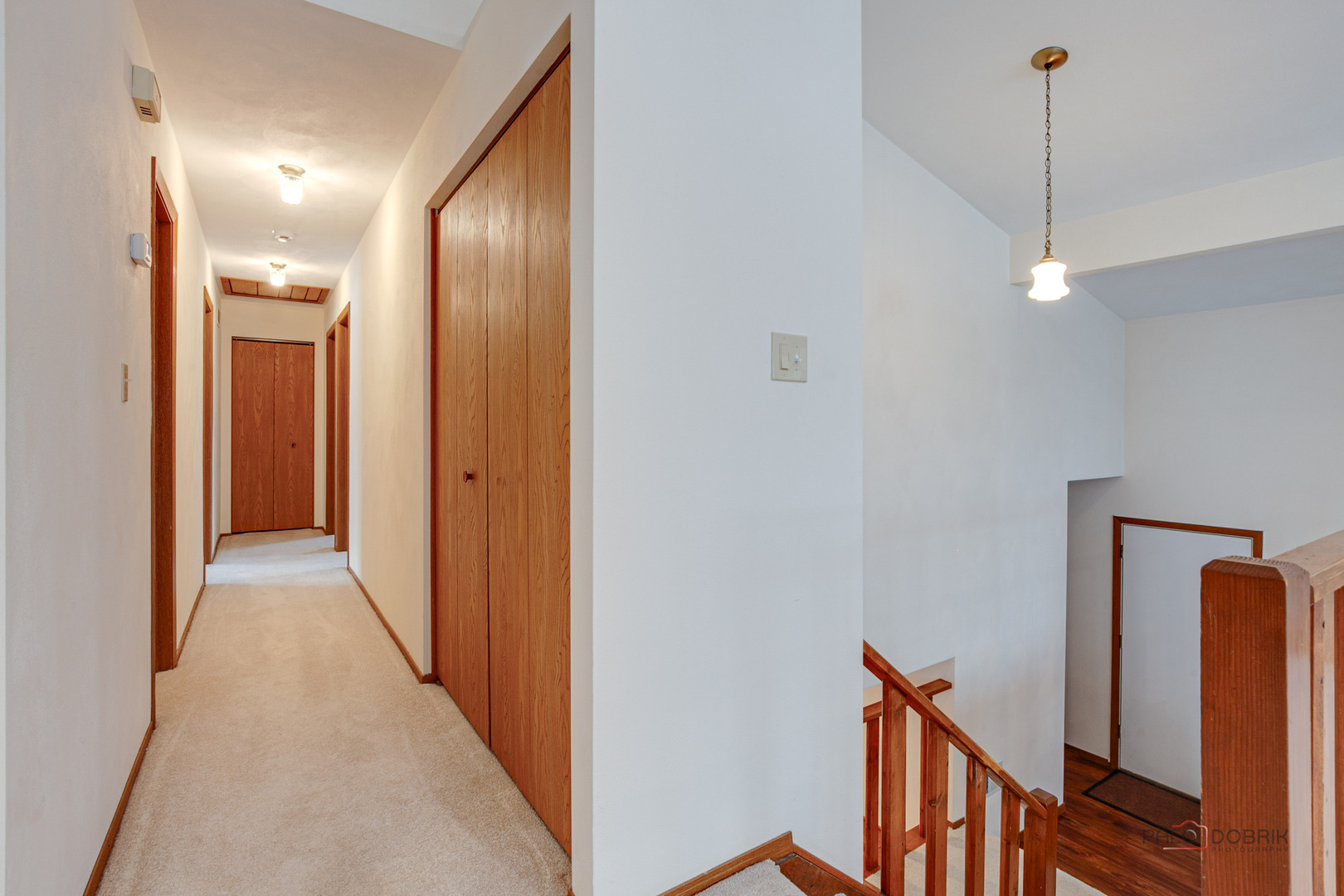 4481 Country Trail Gurnee, IL 60031 - Photo 25 of 42 a view of a hallway with wooden floor