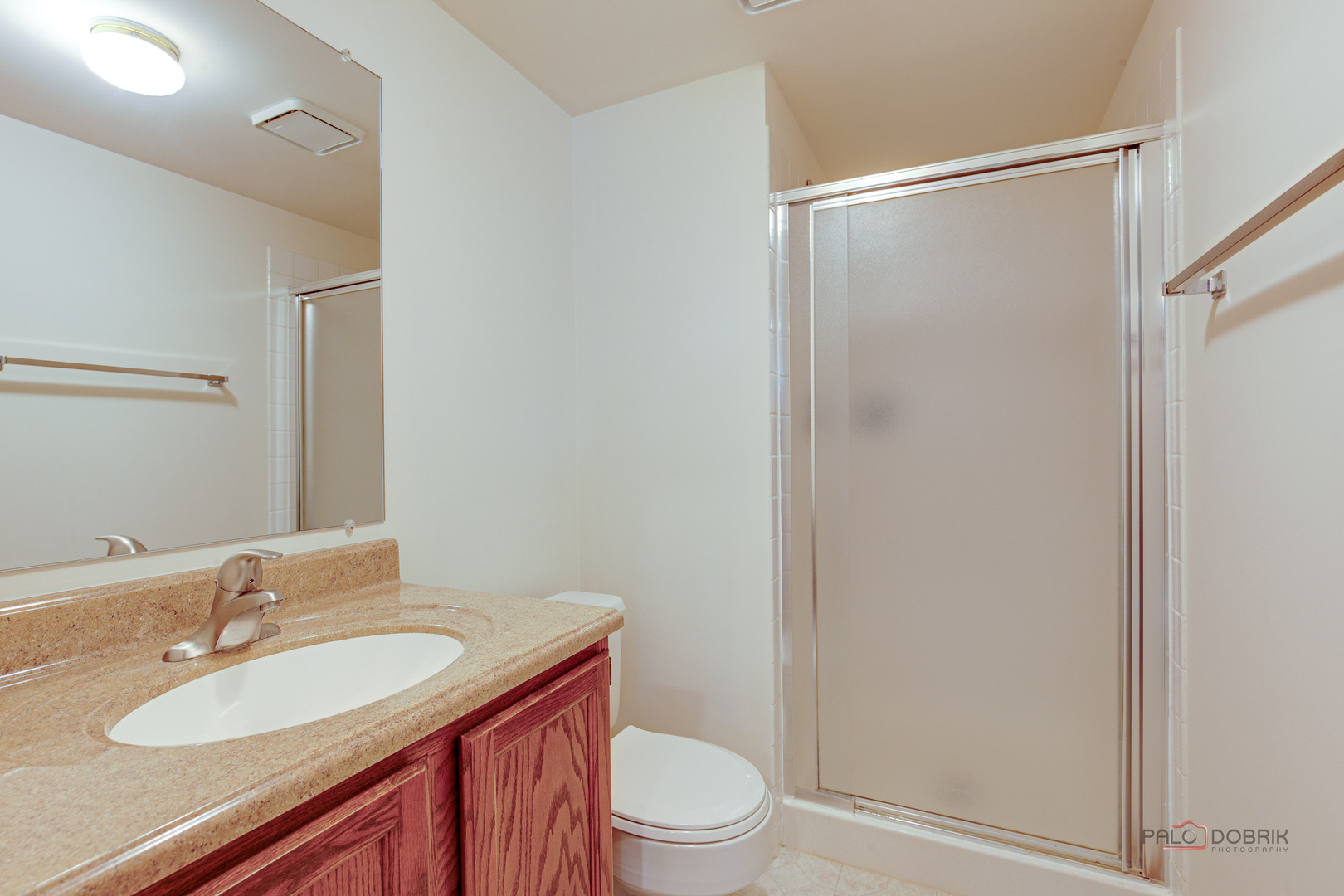 4481 Country Trail Gurnee, IL 60031 - Photo 30 of 42 a bathroom with a granite countertop sink toilet and shower