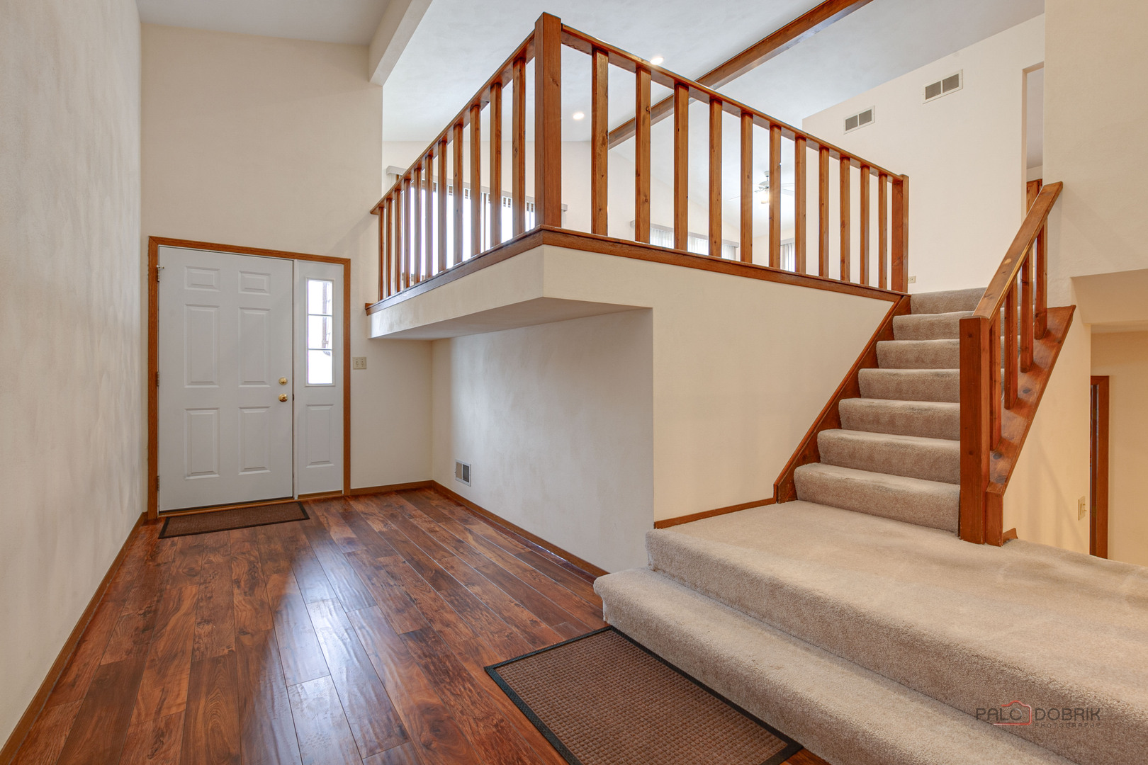 4481 Country Trail Gurnee, IL 60031 - Photo 6 of 42 a view of staircase with wooden floor and stairs