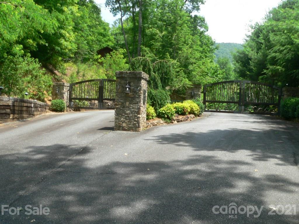 a view of a road with a building in the background