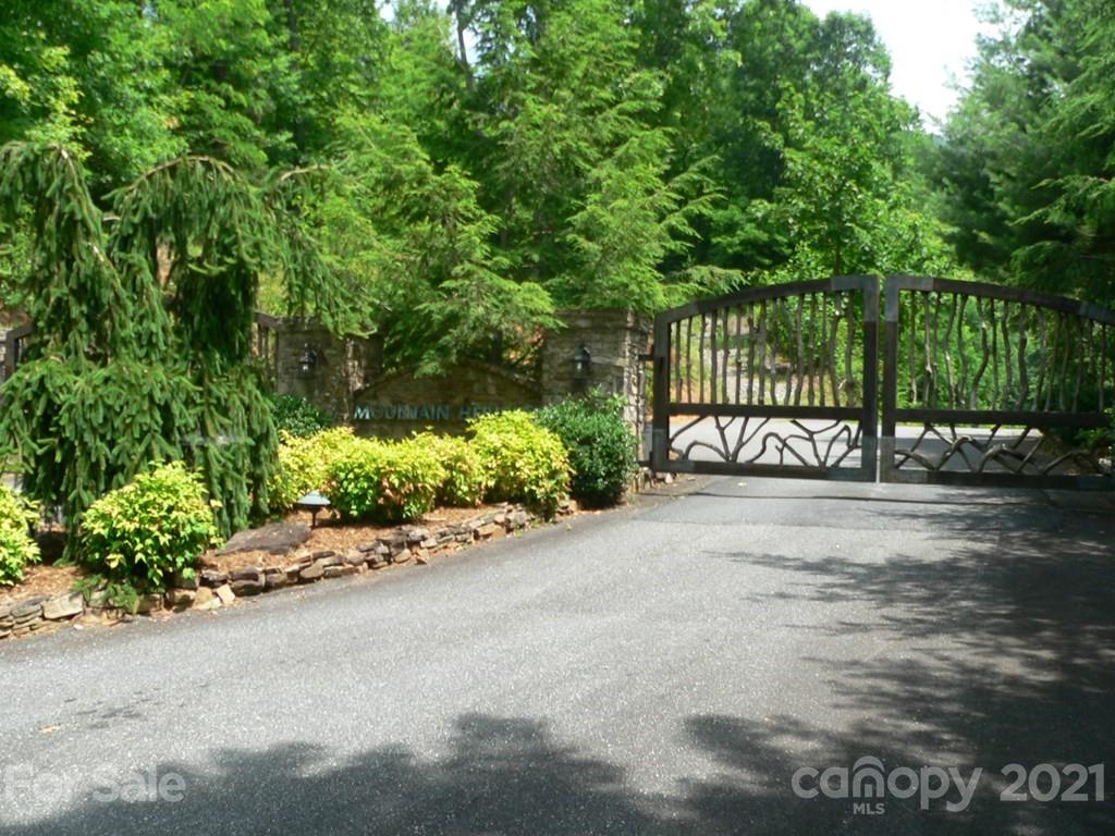 67 Sliding Rock Road Sylva, NC 28779 - Photo 3 of 10 a view of a street with a trees