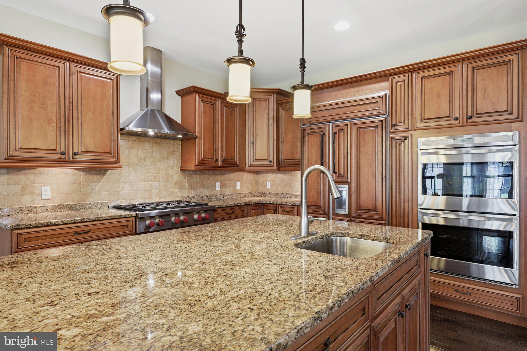 16932 Fitzgeralds Road Lincoln, DE 19960 - Photo 56 of 103 Elegant kitchen with rich wood tones.