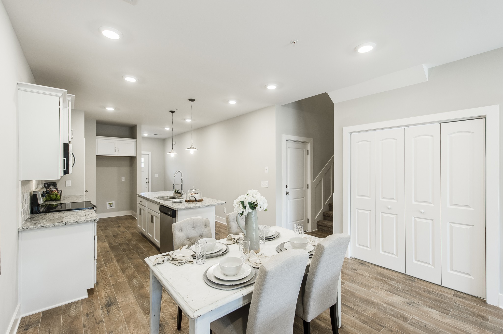 1144 Lock 4 Road, Unit B5 Gallatin, TN 37066 - Photo 12 of 24 The spacious design accommodates a large dining table, perfect for festive dinners and gatherings, while still leaving ample room for additional pieces like a bar cart or a buffet