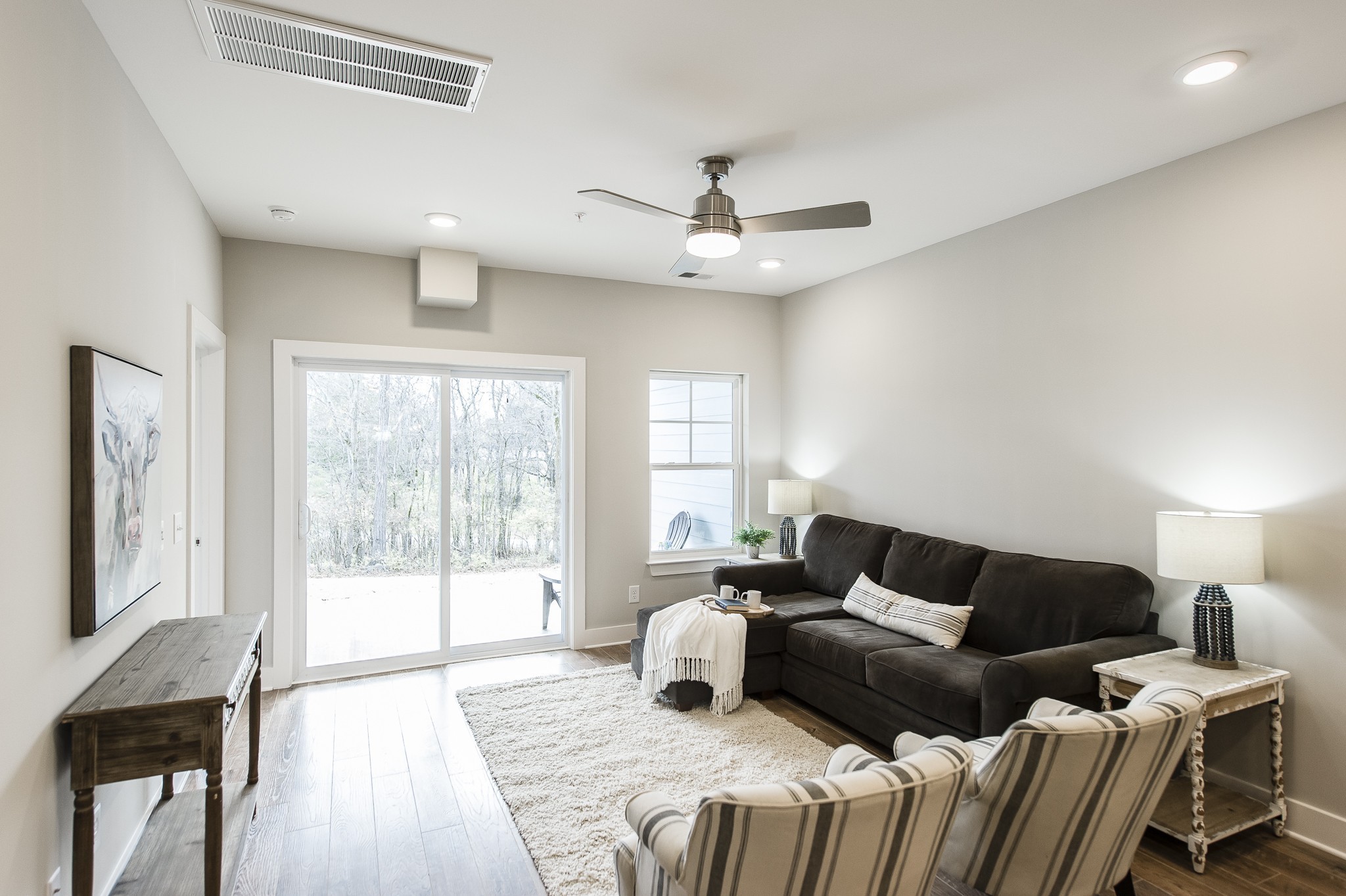 1144 Lock 4 Road, Unit B5 Gallatin, TN 37066 - Photo 6 of 24 In the living room space, there are sliding doors that will take us out back to enjoy the beautiful lake views!