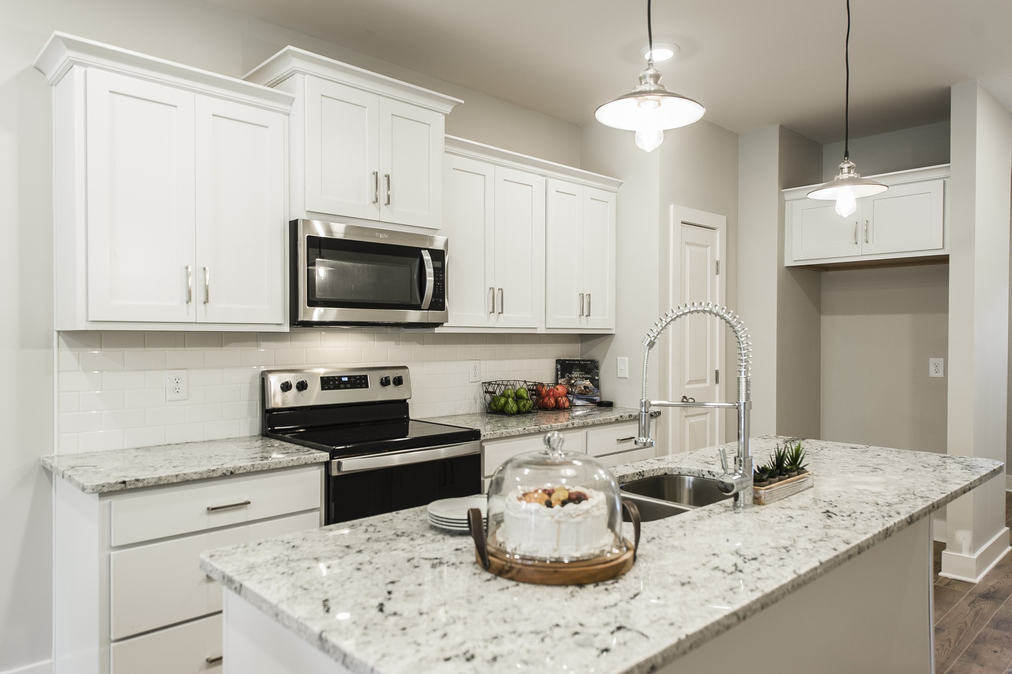 1144 Lock 4 Road, Unit B5 Gallatin, TN 37066 - Photo 10 of 24 So much cabinet space for all your needs and a very large island that will fit 4 bar stools! Perfect for guests and entertaining!!