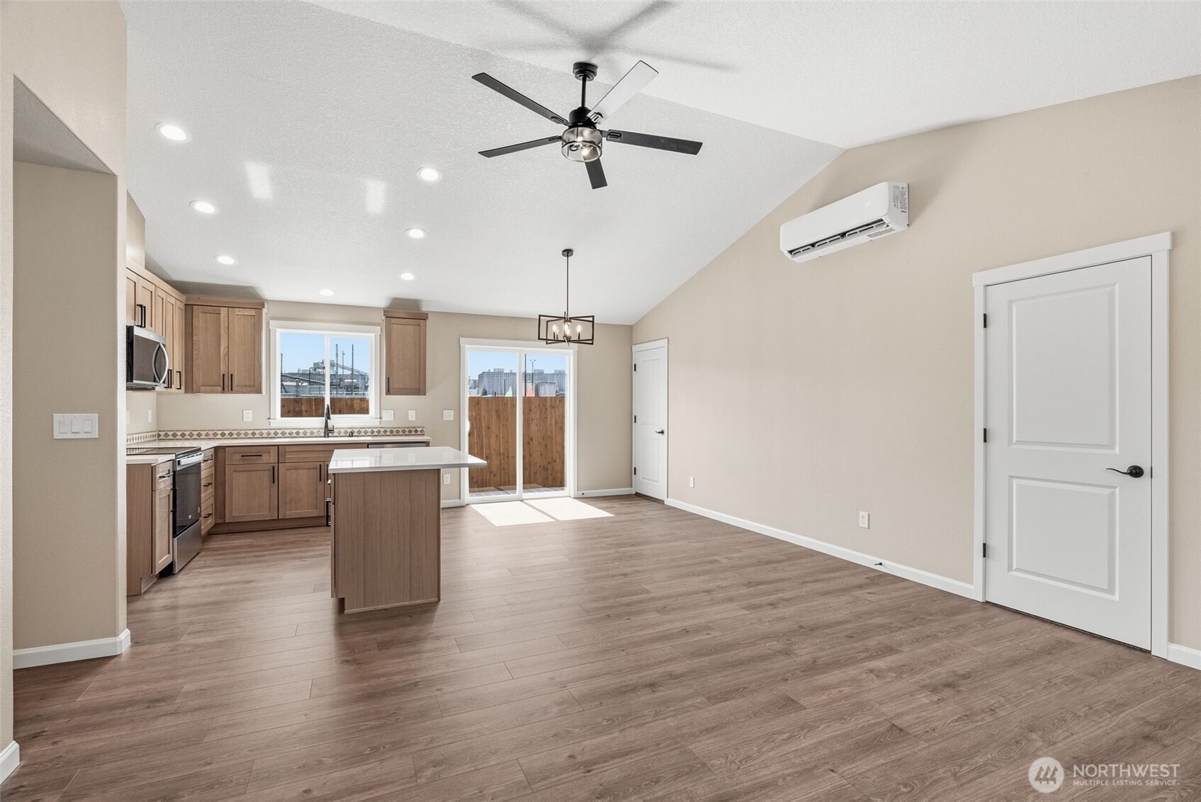 204 Douglas Street Longview, WA 98632 - Photo 23 of 31 a view of kitchen with cabinets and wooden floor