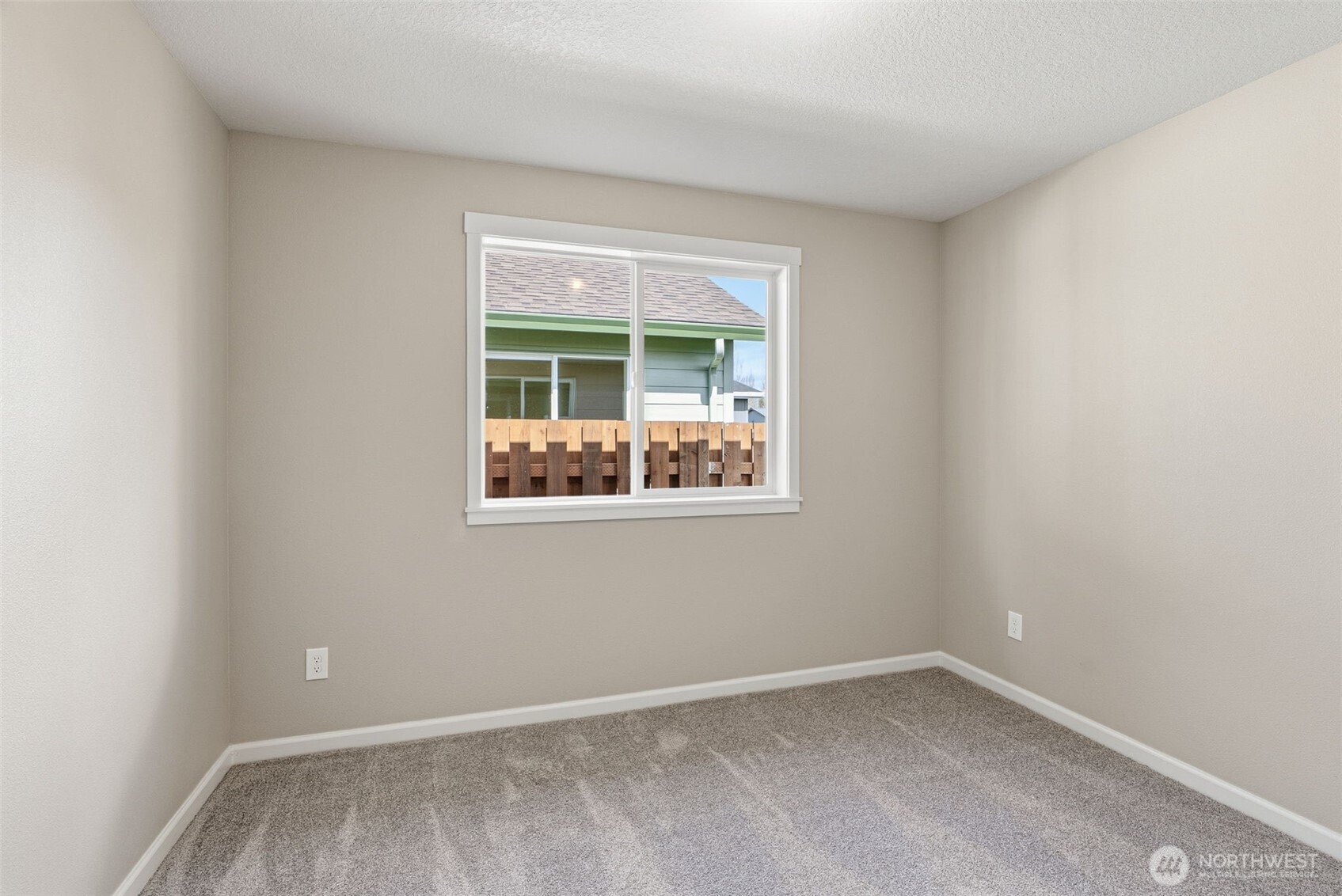 204 Douglas Street Longview, WA 98632 - Photo 26 of 31 an empty room with a window