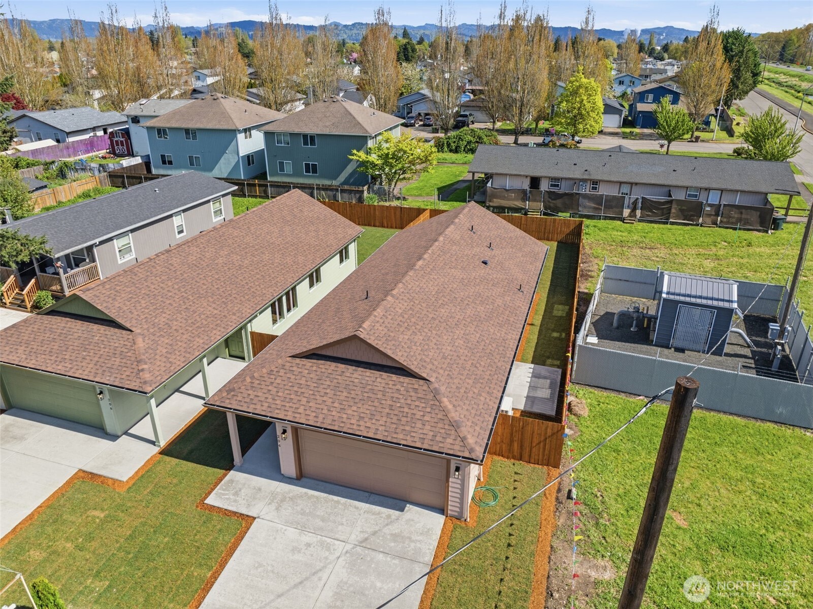 204 Douglas Street Longview, WA 98632 - Photo 4 of 31 an aerial view of a house with swimming pool