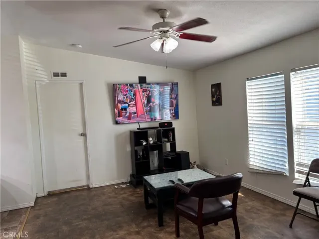 a view of a livingroom with furniture