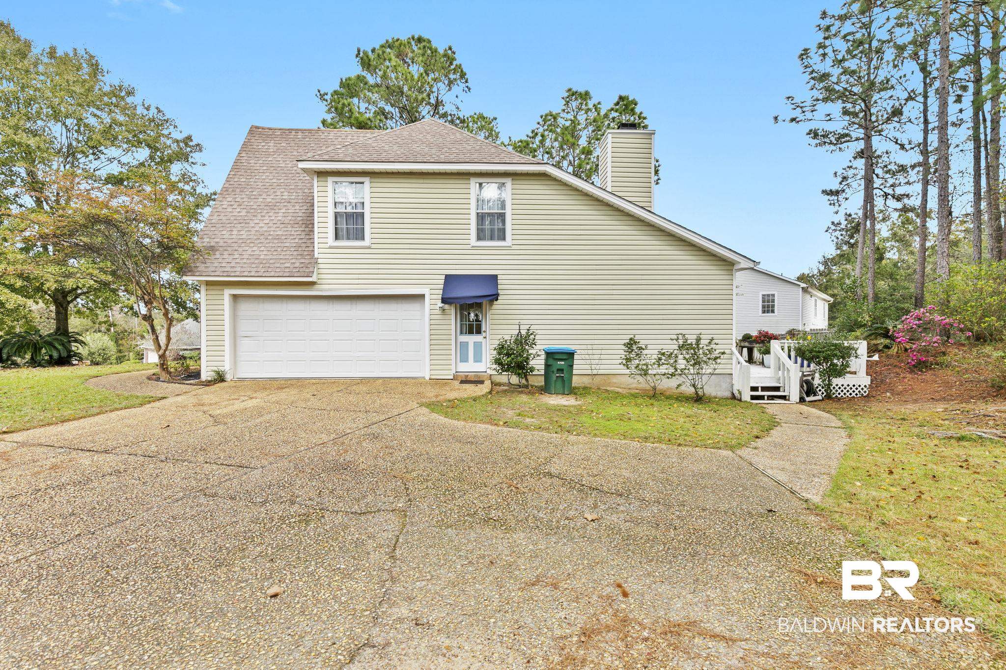 22 Pirates Lane Daphne, AL 36527 - Photo 4 of 36 View of property exterior with a wooden deck