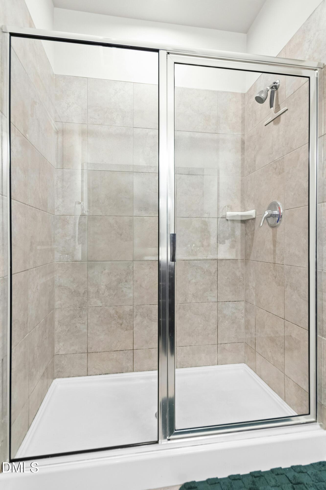 3645 Water Mist Lane Raleigh, NC 27604 - Photo 16 of 29 a bathroom with a shower