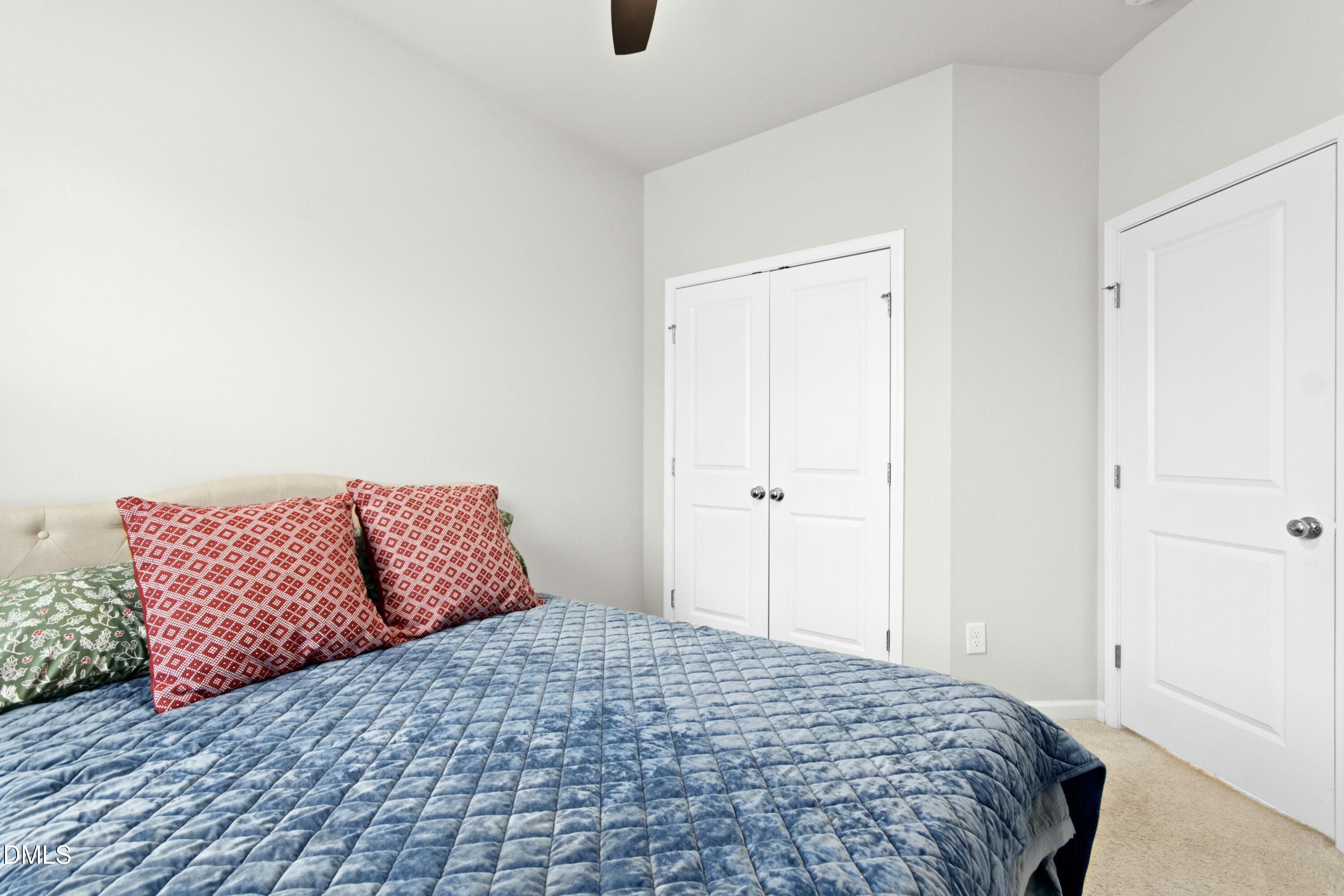 3645 Water Mist Lane Raleigh, NC 27604 - Photo 21 of 29 a bedroom with a bed and window