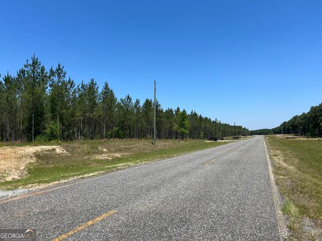 a view of a lake with a big yard