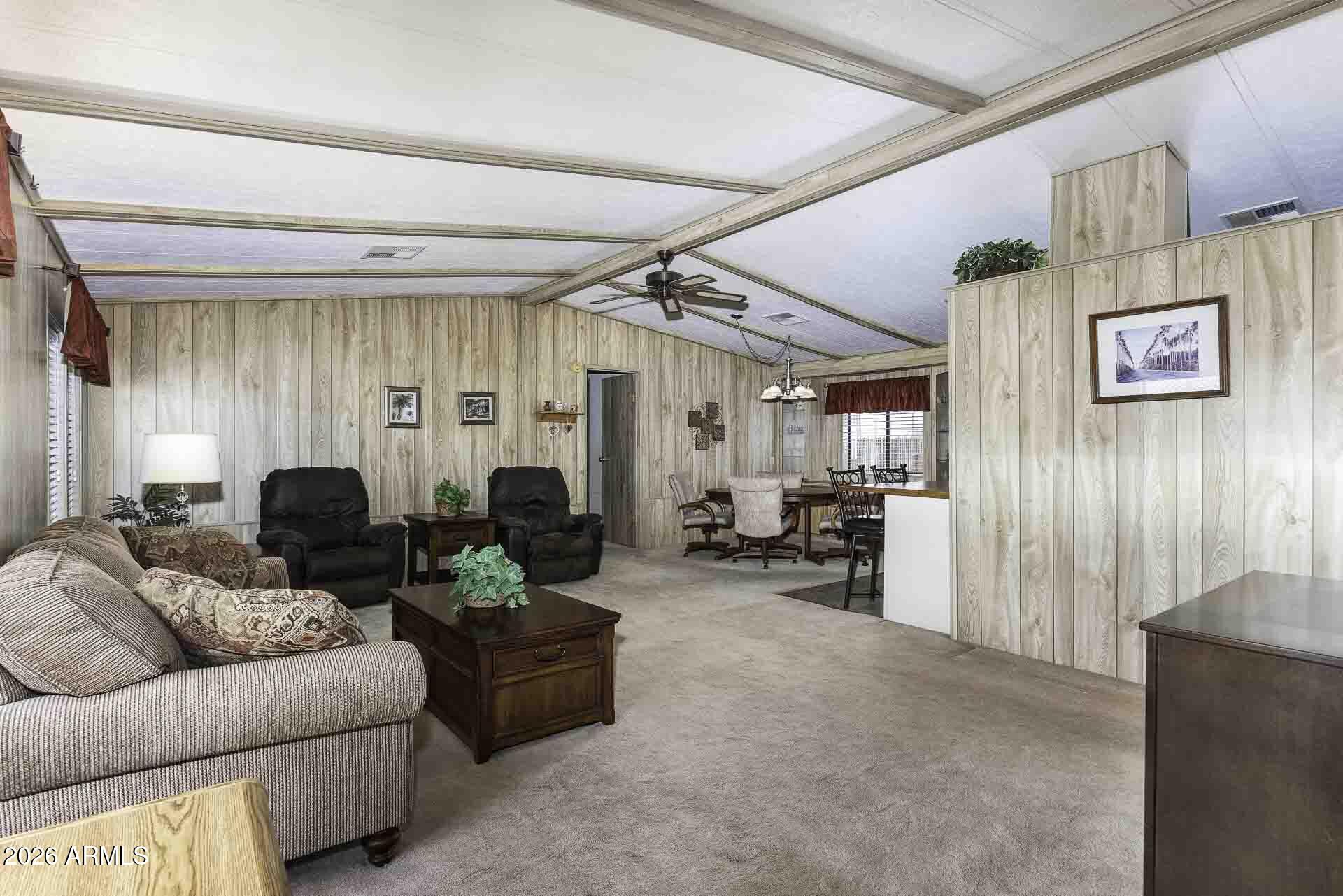 2100 North Trekell Road, Unit 143 Casa Grande, AZ 85122 - Photo 24 of 34 a living room with furniture and a large window