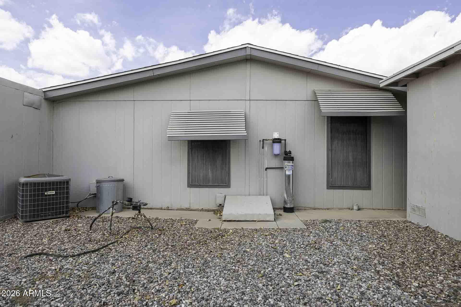 2100 North Trekell Road, Unit 143 Casa Grande, AZ 85122 - Photo 32 of 34 a house view with a backyard space