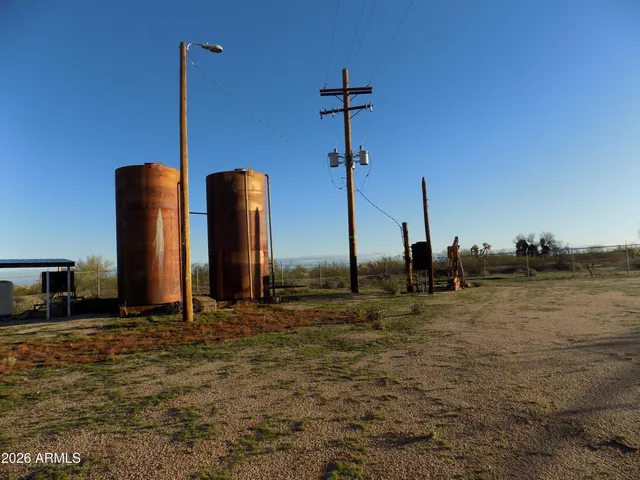 a view of swimming pool with outdoor seating