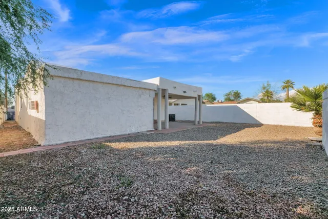 a backyard of a house with lots of green space