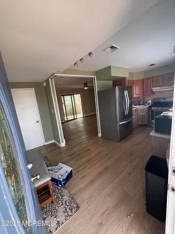 a view of ocean with a yard