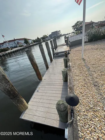 a view of a lake with a car parked