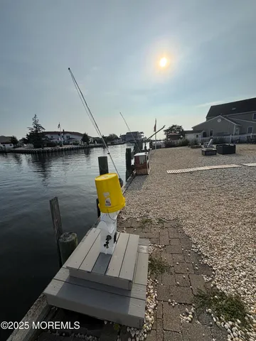 an aerial view of a house with outdoor space
