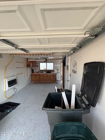 a view of a terrace with a table and chairs