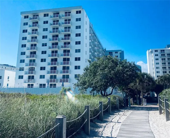 a view of staircase with wooden floor