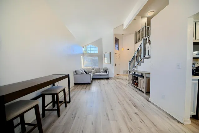 a kitchen with stainless steel appliances a refrigerator a stove a microwave and cabinets