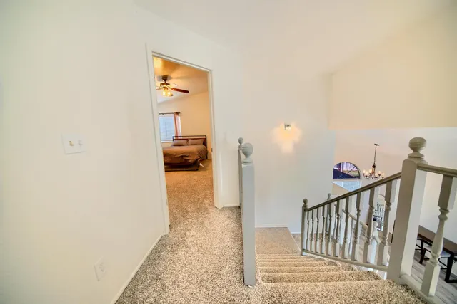 a view of front door with wooden floor