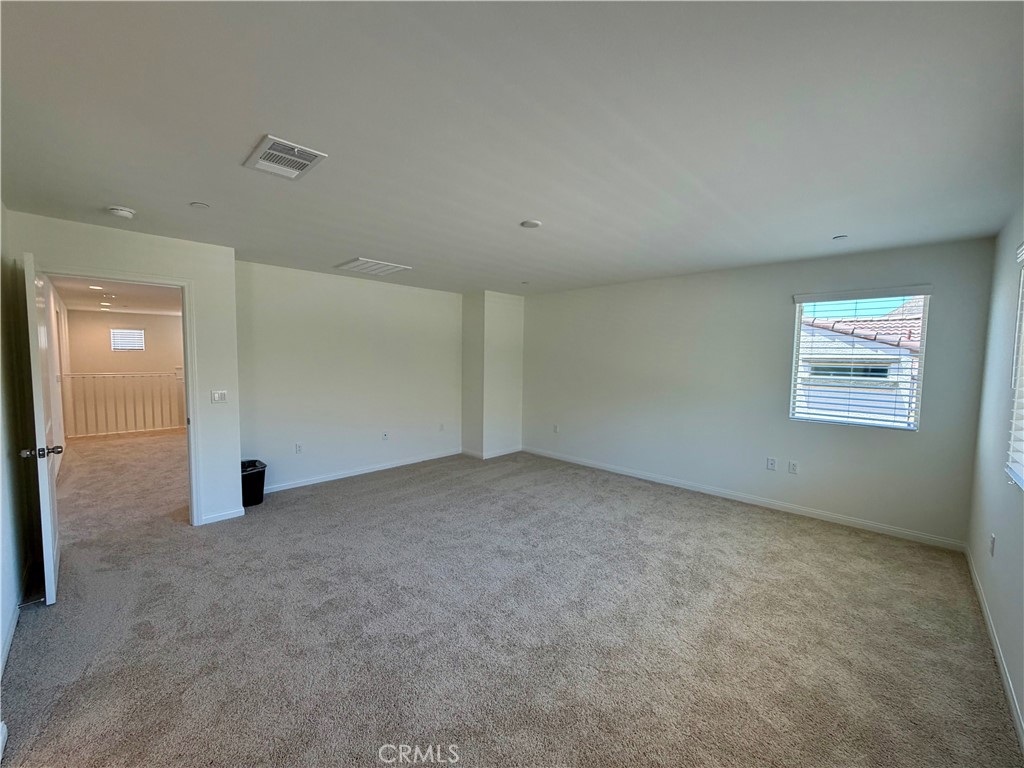 21624 Thomas Court Riverside, CA 92507 - Photo 24 of 36 an empty room with windows