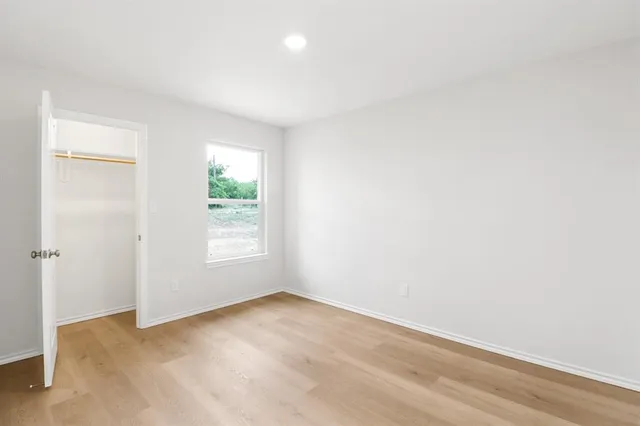 an empty room with windows