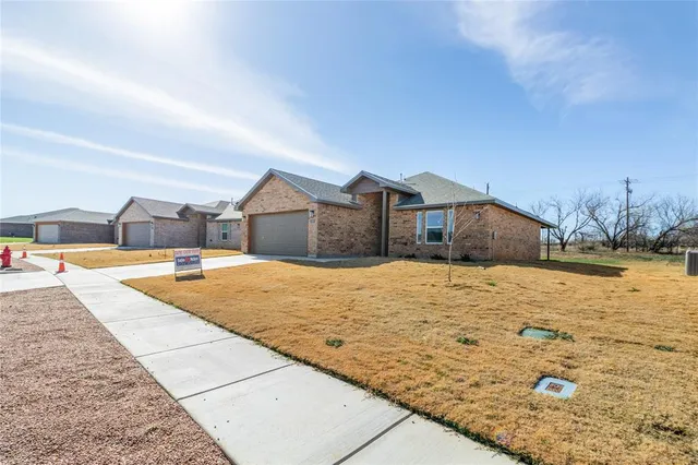 a swimming pool with a yard